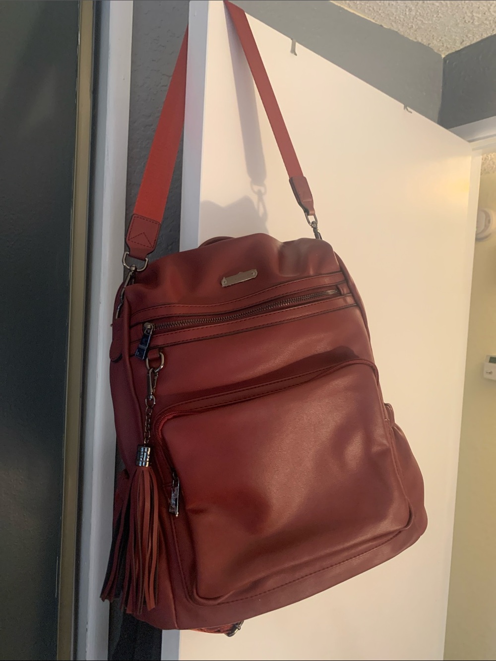 Structured Travel Backpack in Deep Burgundy with Tassel Accent